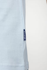 Camiseta Celeste Con Logo Tipo Parche